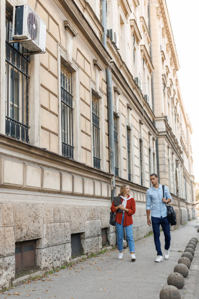 istock Young couple walking in the city 2186740165