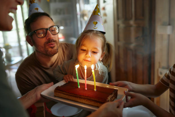 istock Blowing Birthday candles on a cake! 2186742999
