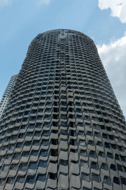 istock Skyline Of Skyscraper In Singapore On Partially Cloudy Background 2186744495