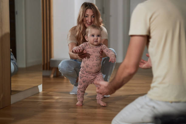 istock First steps of our baby 2186744716
