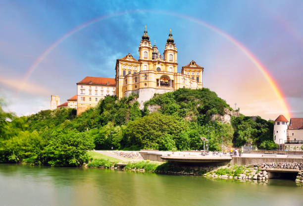 istock Rainbow over Melk Abbey with reflection in water, Wachau - Austria 2186745906