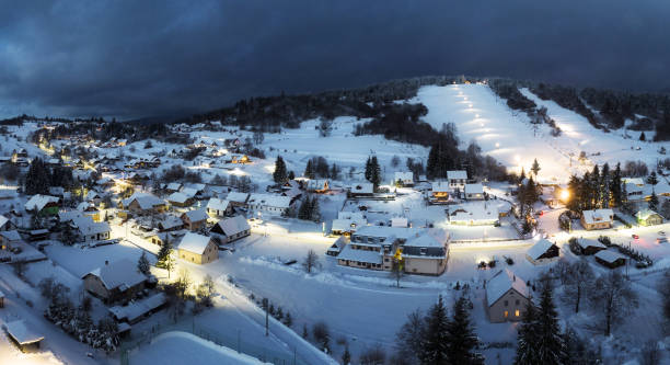 istock Winter ski slope at night with cable car 2186746012