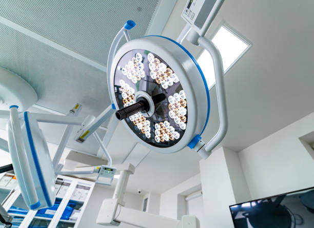 istock A bright light is shining on a hospital room. The light is on a machine that is used for medical procedures. 2186746643