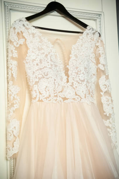 istock Lace Wedding Dress On Hanger 2186748073