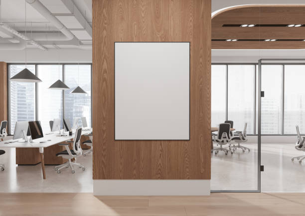 istock Blank poster on wooden wall in modern office space mockup. 3D Rendering 2186748403