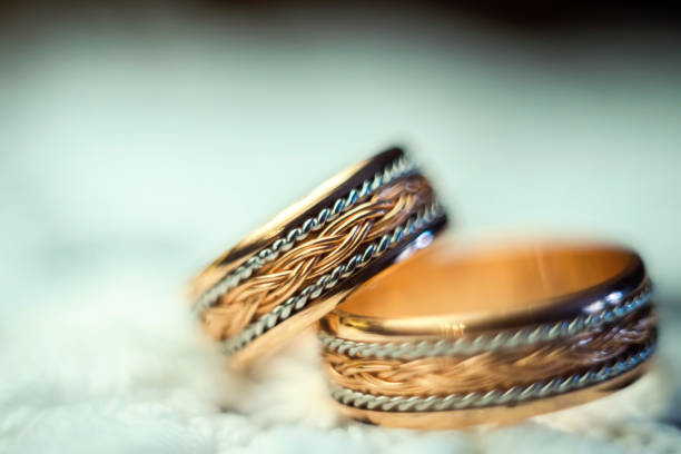 Two magnificent gold rings with large natural princess-cut or Square Modified Brilliant diamonds