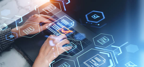 istock Businesswoman typing on laptop, glowing checkmark, audit and analysis 2186749016