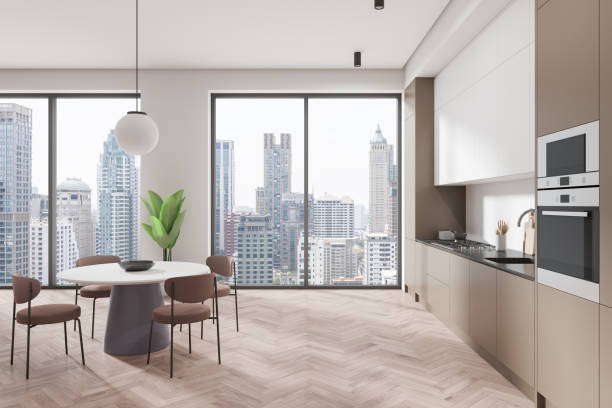 istock Modern kitchen interior with dining area and city view. 3D Rendering 2186750327