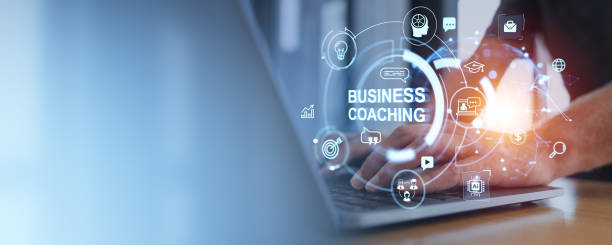 istock Man typing on laptop, business coaching and mentoring symbols. Copy space 2186750334