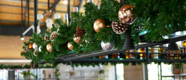 A restaurant decorated with Christmas-themed accessories and ornaments