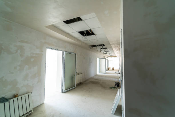 Unfinished interior space showing bare walls ready for future design work.