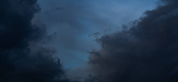 istock Cloud storm sky dark halloween background rain lightning thunder stoumy typhoon Nature light scene rainy atmosphere damage effect carbon dioxide dust air pollution 2.5 Pm, texture nature windstorm. 2186752316