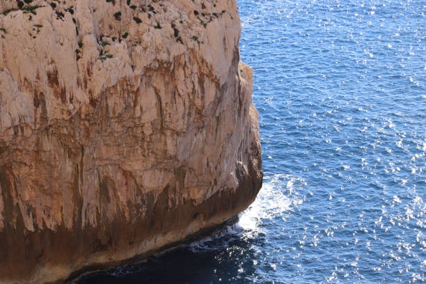 istock Rock and sea, an eternal embrace 2186752499