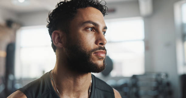 istock Man, sweating and thinking as tired in workout, intense exercise and wellness with fatigue. Male person, recovery and exhausted as athlete for health, challenge and training in fitness, sports or gym 2186754982