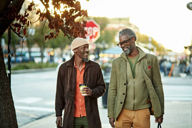 istock Men walking, talking, and enjoying weekend leisure 2186755972