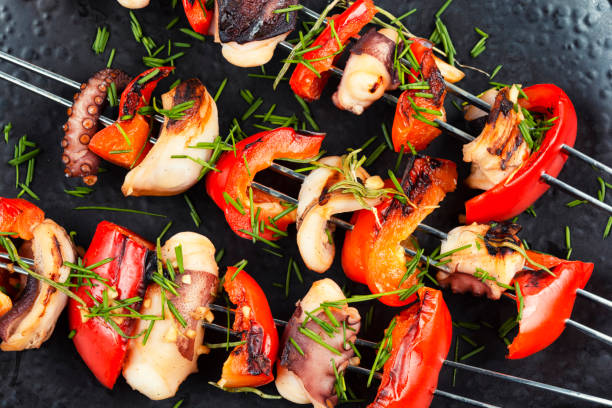 istock Grilled squid or octopus skewers,BBQ grill. 2186756732
