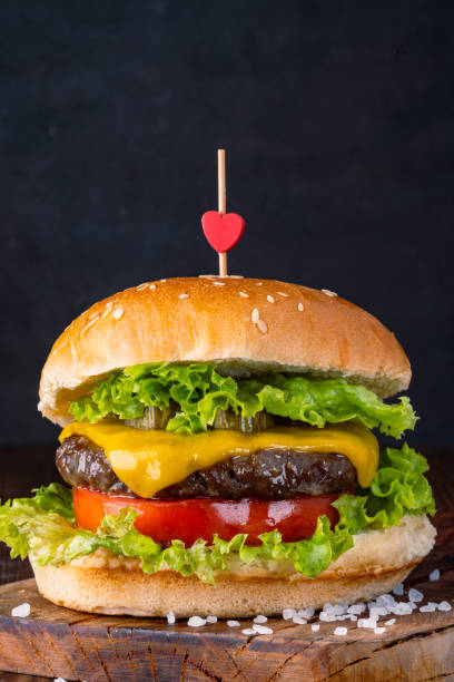 istock Delicious and large hamburger or cheeseburger 2186759103