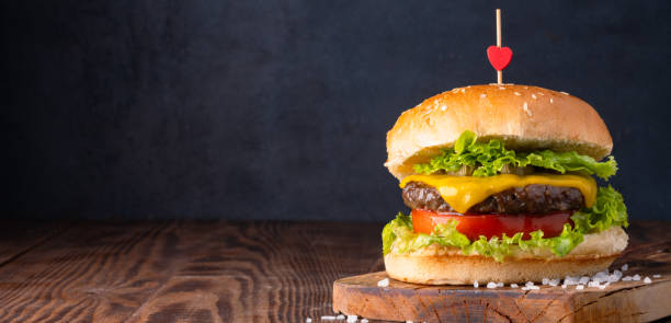 istock Delicious and large hamburger or cheeseburger 2186759125