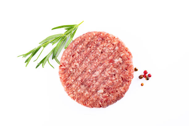 istock Isolated raw hamburger patty on white background. 2186759563