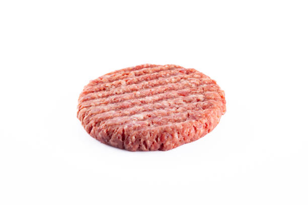 istock Isolated raw hamburger patty on white background. 2186759567
