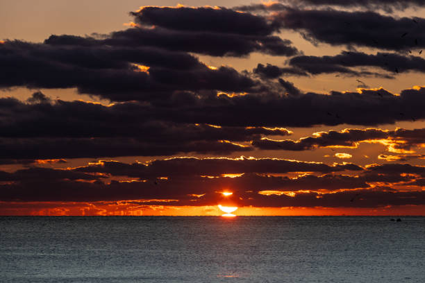 Sun is setting over by the sea.Istanbul - Turkey.