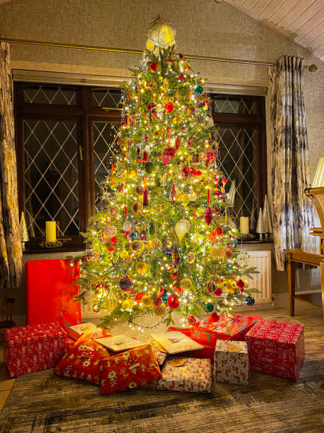 istock An English Christmas Tree with presents 2186763263
