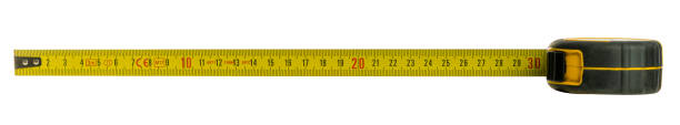 istock Yellow measuring tape showing metric numbers on white background 2186763542