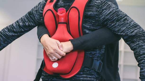 istock first aid course - company safety - Heimlich maneuver 2186767923
