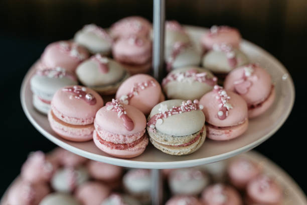 istock Pink and White French Macarons on Three-Tier Dessert Stand 2186768988