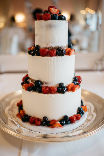istock White Wedding Cake with Fresh Summer Berries 2186769073