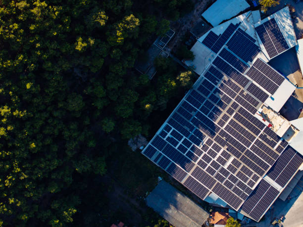istock SOLAR ENERGY SYSTEMSclean environment and sustainable energy source solar energy.workplaces,large warehouses,gas stations,barns,roof mounted solar energy panels and open land electricity production 2186769936