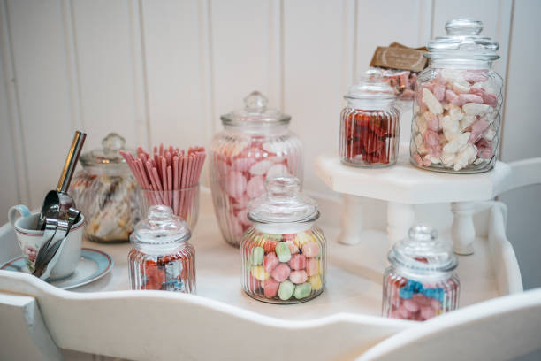 istock Candy Bar Setup with Glass Jars on White Display 2186770053