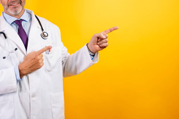 istock A self-confident doctor pointing to one side. 2186771211