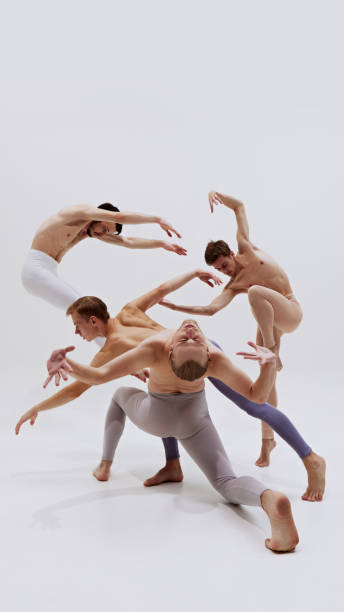 istock With every leap and turn, dancers showcase physical prowess and artistic sensitivity that define modern ballet against white studio background. 2186772811