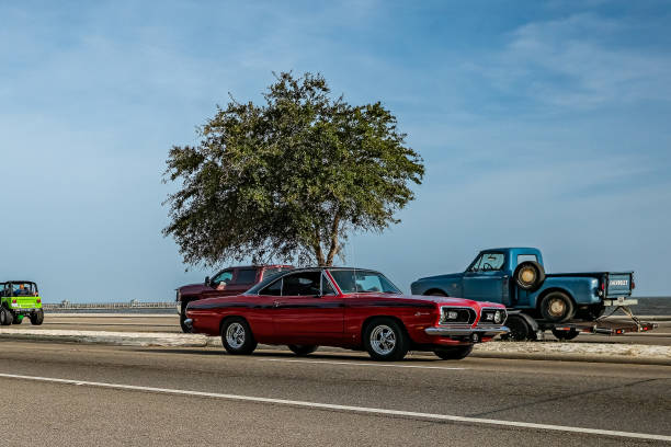Gulfport, MS - October 04, 2023: Wide angle front corner view of a 1967 Plymouth Barracuda Hardtop Coupe at a local car show.
