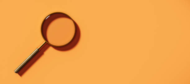 istock Magnifying glass on orange background with empty space for text or design template, symbolizing search, research, business, or branding. 3D Rendering 2186776938