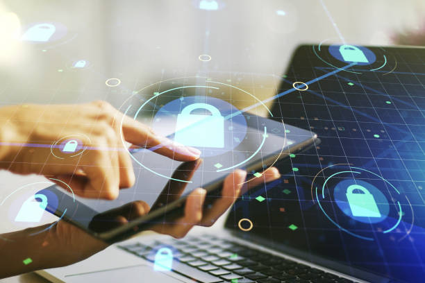 istock Creative idea concept with lock symbol and microcircuit illustration and with finger clicks on a digital tablet on background. Protection and firewall concept. Multiexposure 2186778731
