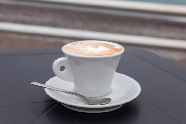 istock Cappuccino with drawing on a milk foam in white cup 2186778853