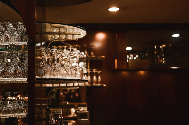 istock Wine glasses hang over in a retro pub. 2186784276