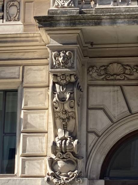 istock Decorative bracket with allegorical head, rosette, cartouche and swag. 2186785427
