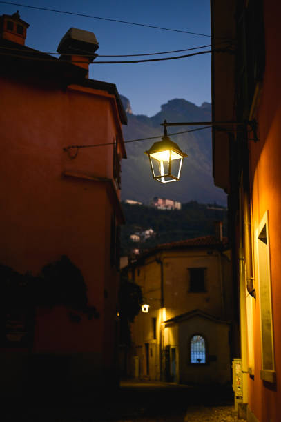istock Lantern at night in old town street. 2186785584