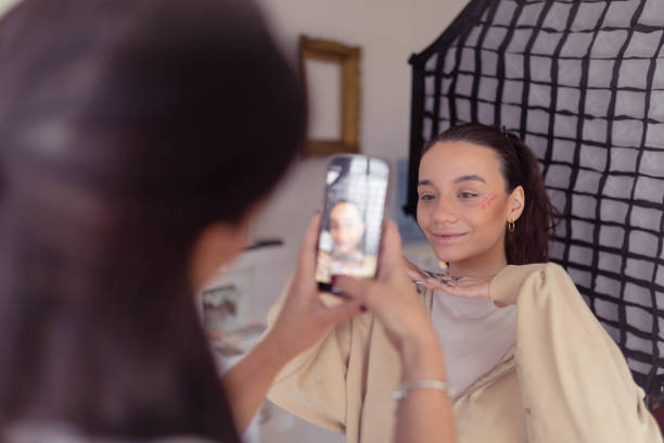 istock The blogger shows off the liquid blush she uses. 2186788221