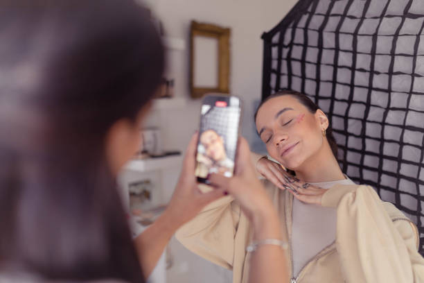 istock The blogger shows off the liquid blush she uses. 2186788222