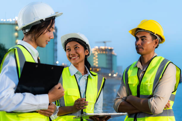 istock Industrial team discussing project at refinery 2186789191