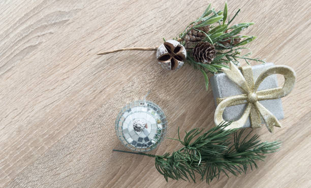 Christmas decoration and gift boxes on wooden background. High quality photo