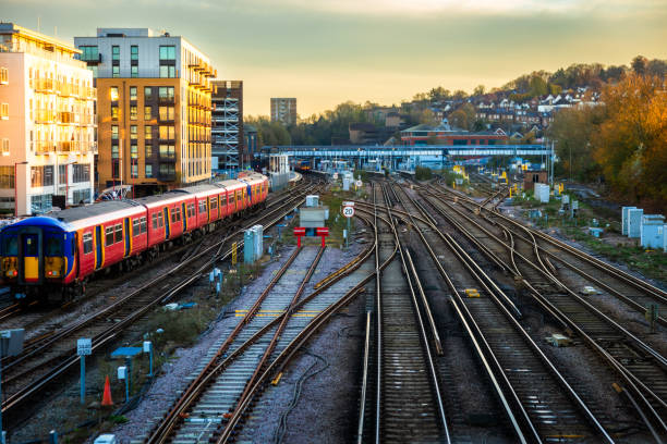 istock Elevated view of passenger train approaching station in Guildford, Surrey, UK 2186791041