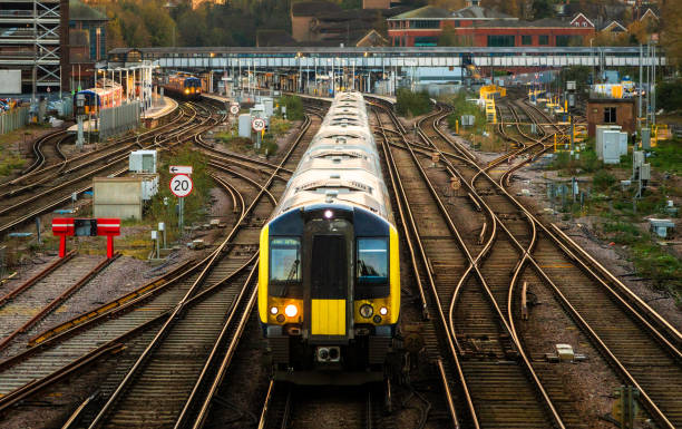 istock Elevated view of passenger train approaching station in Guildford, Surrey, UK 2186791046