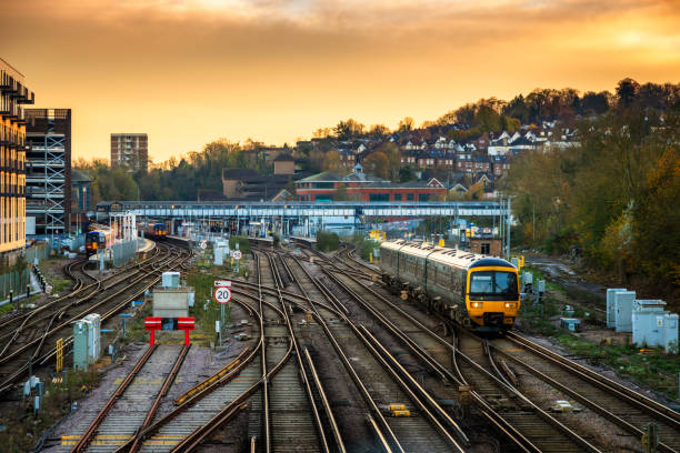 istock Elevated view of passenger train approaching station in Guildford, Surrey, UK 2186791068