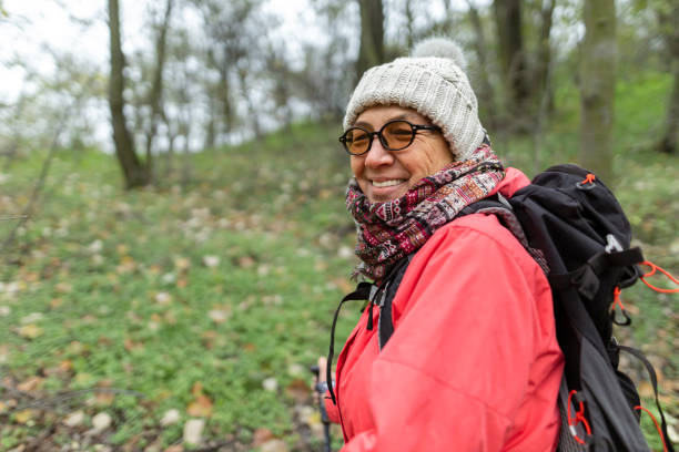istock Smiling woman enjoying a hike in the forest 2186797418