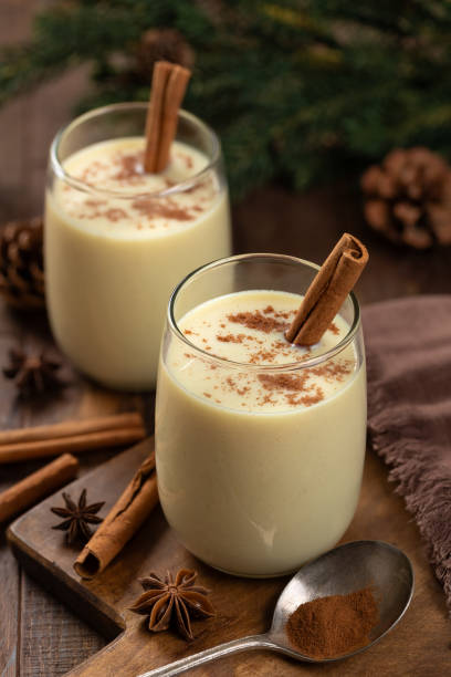 istock Two glasses of eggnog with cinnamon and anise 2186797860